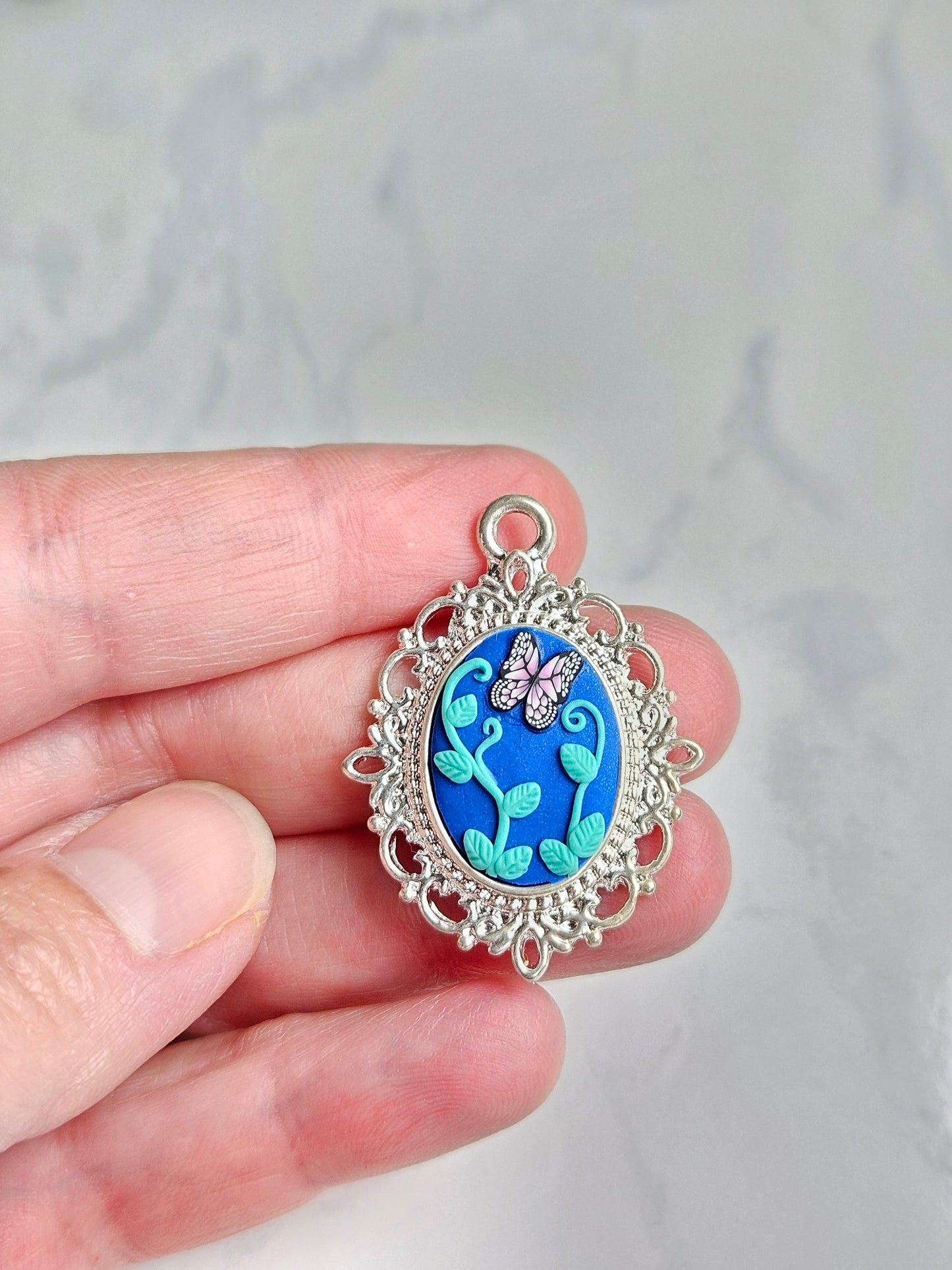 Necklace - dark blue with pink butterfly