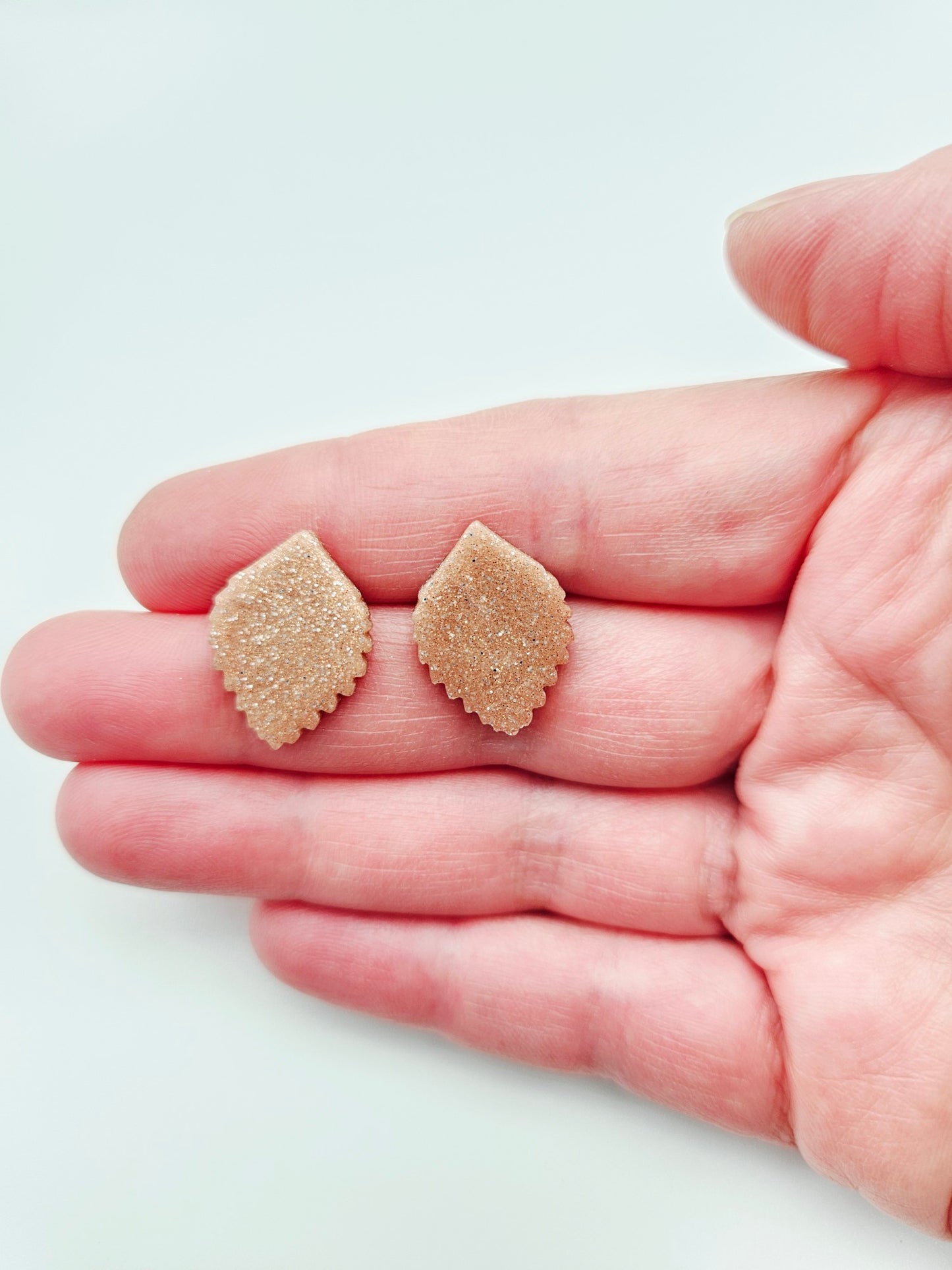 Earring studs - rose gold leaves