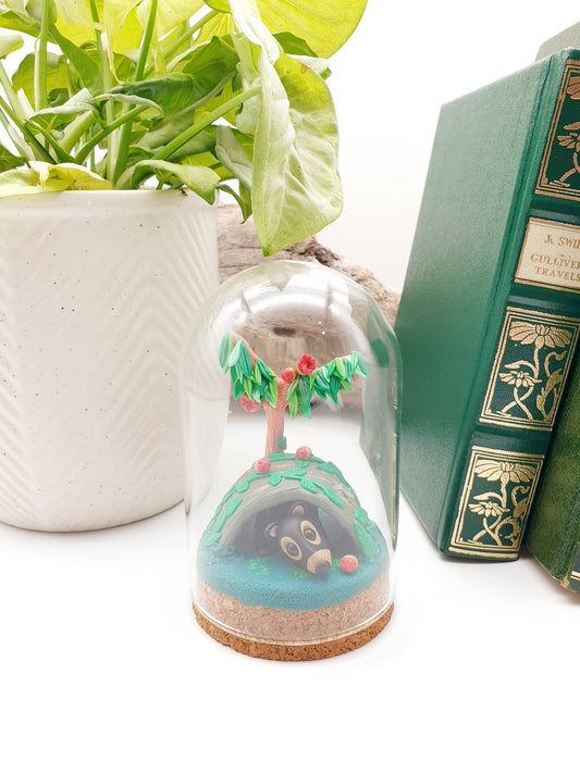 Tasmanian devil under a gum tree sculpture in cloche