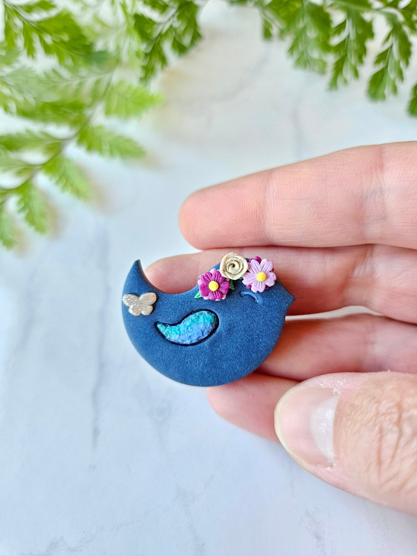 Bird brooch with flowers & butterfly