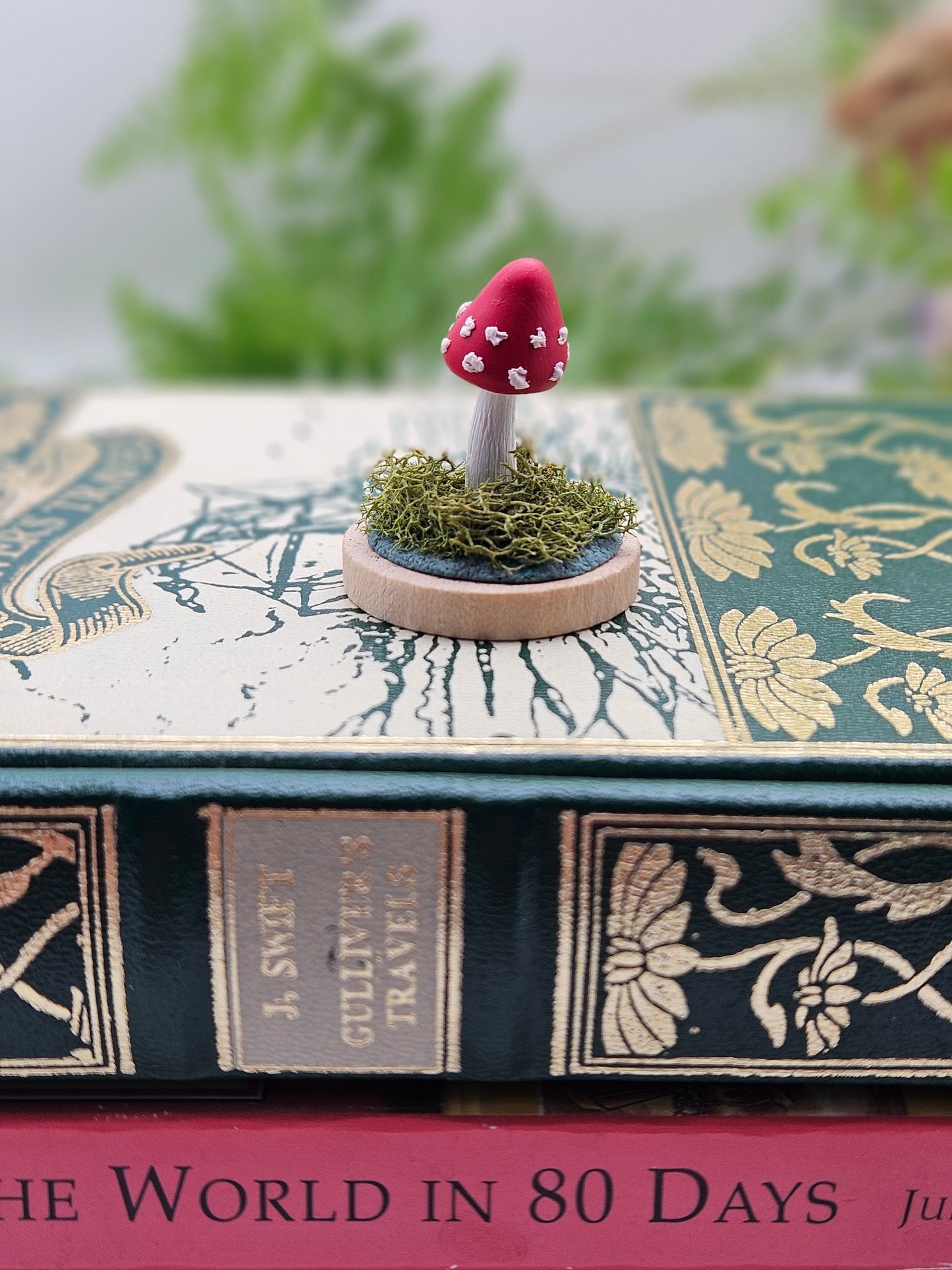 Mini amanita mushroom with real sage moss