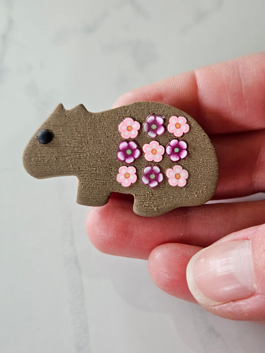 Wombat brooch with flower patch