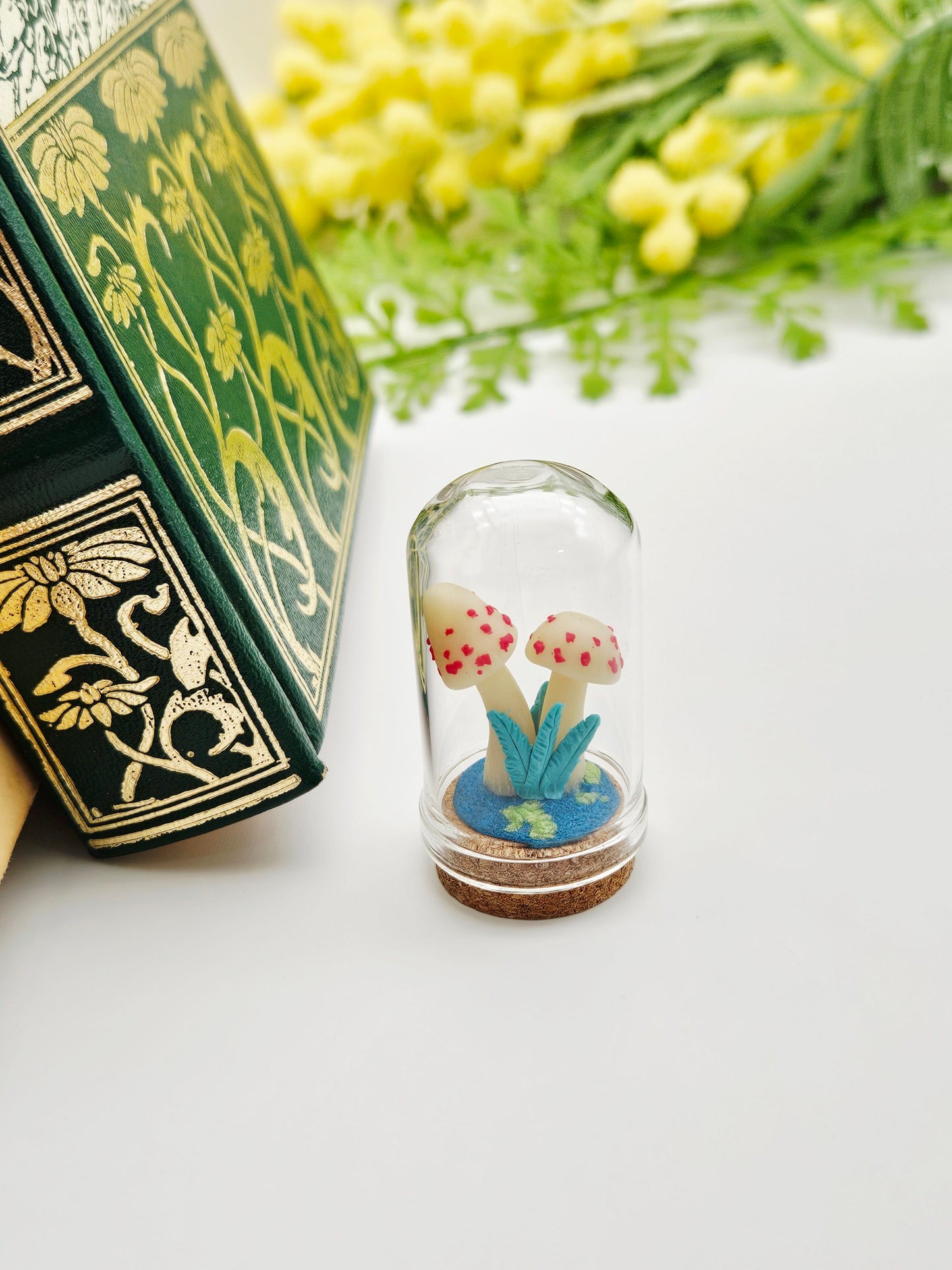 Glow in the dark mushrooms with glass cloche