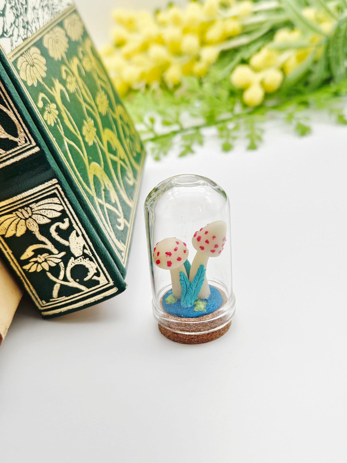 Glow in the dark mushrooms with glass cloche