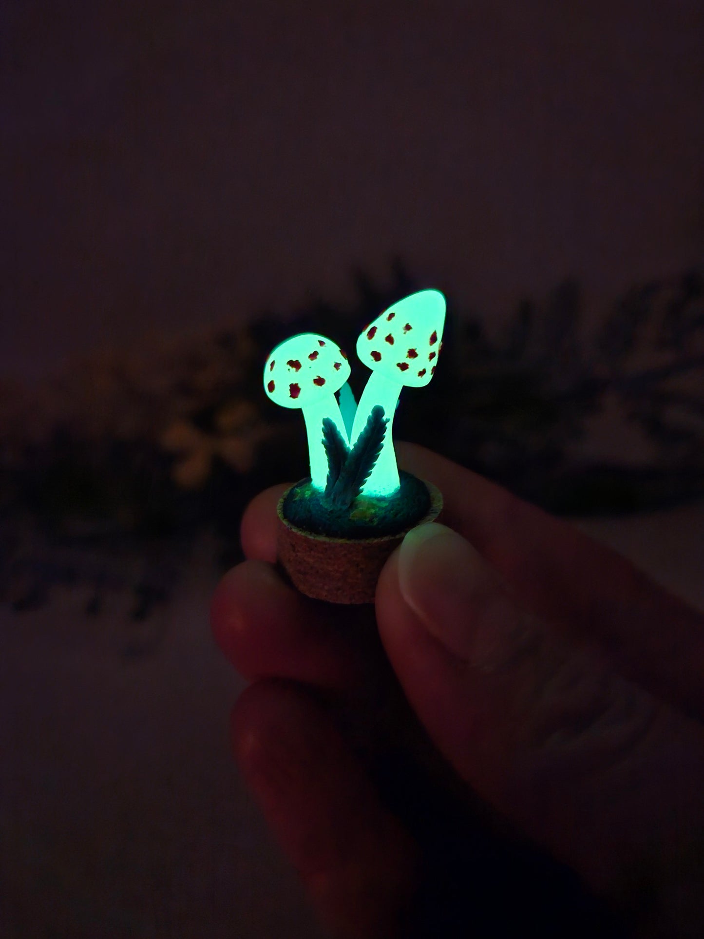 Glow in the dark mushrooms with glass cloche