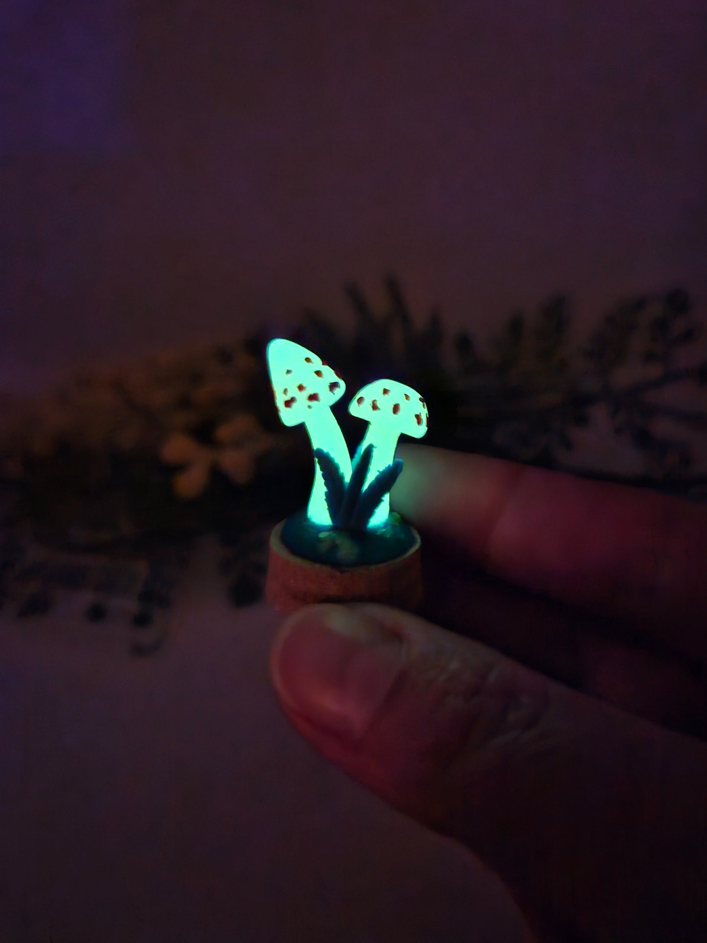 Glow in the dark mushrooms with glass cloche